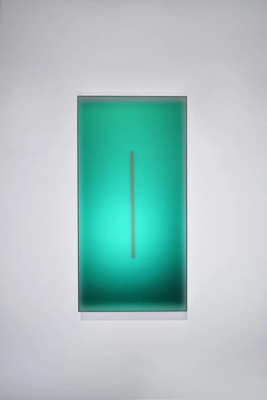 Casper Brindle, Light Glyph in green — a tall luminous panel.